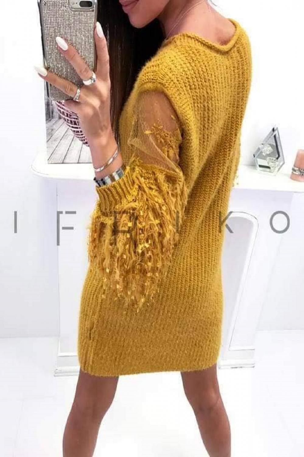 Knitted dress with impressive sleeves